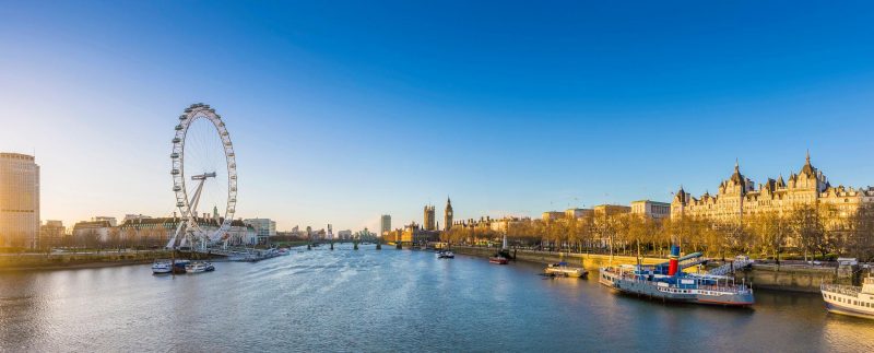 Luxury London skyline at sunset representing the CMA Headline Pricing Guidance for transparent holiday pricing in the UK travel industry